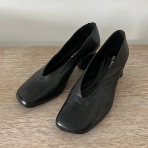 Black mid heel asymmetric toe Halmanera shoes